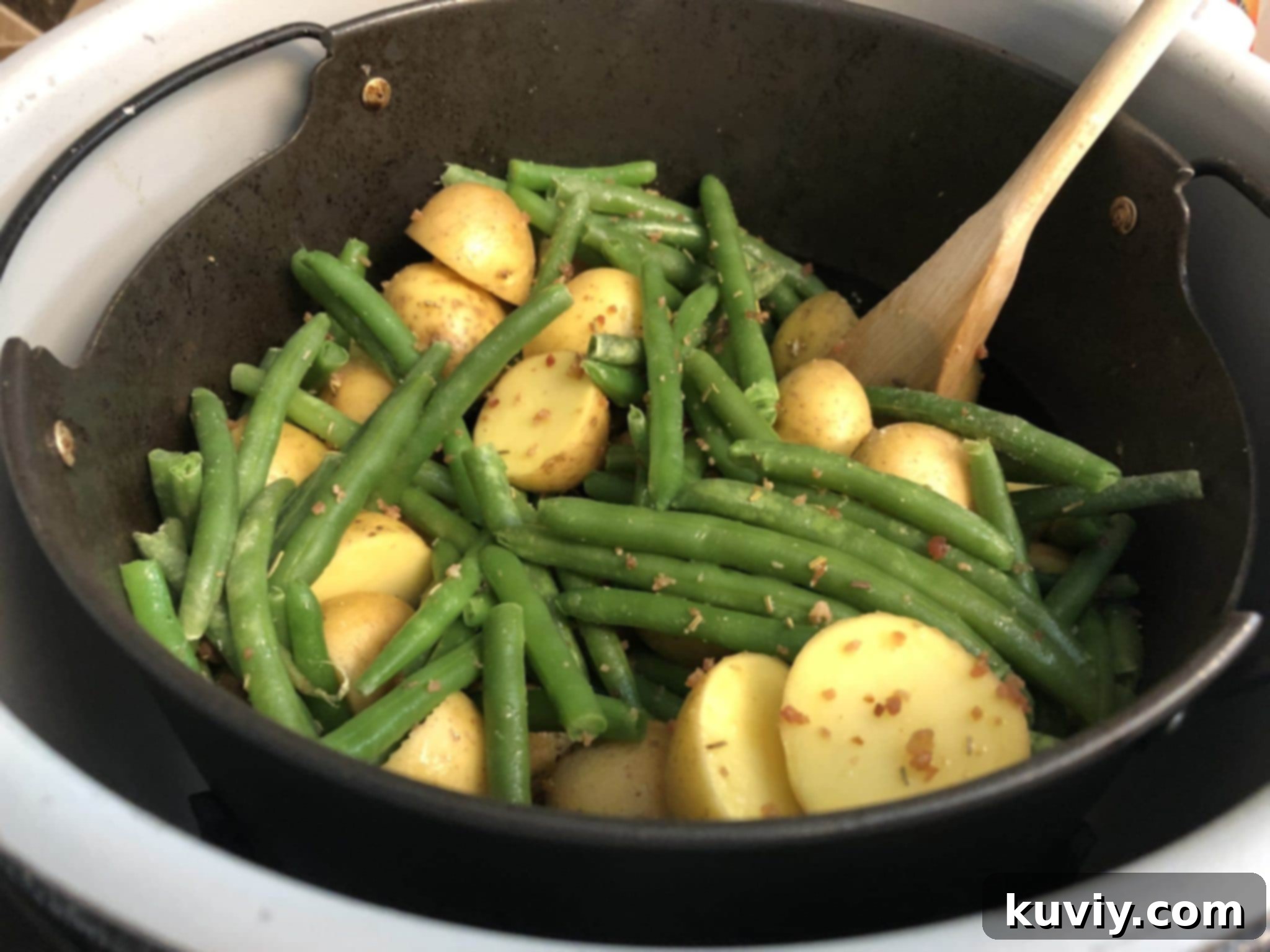 air fryer green beans and potatoes in the air fryer basket