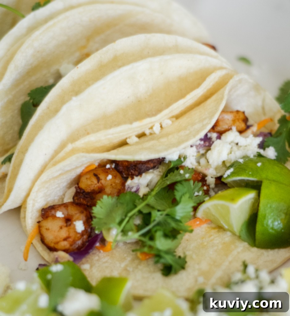 Crispy Air Fryer Shrimp Tacos with fresh toppings, perfect for a quick meal