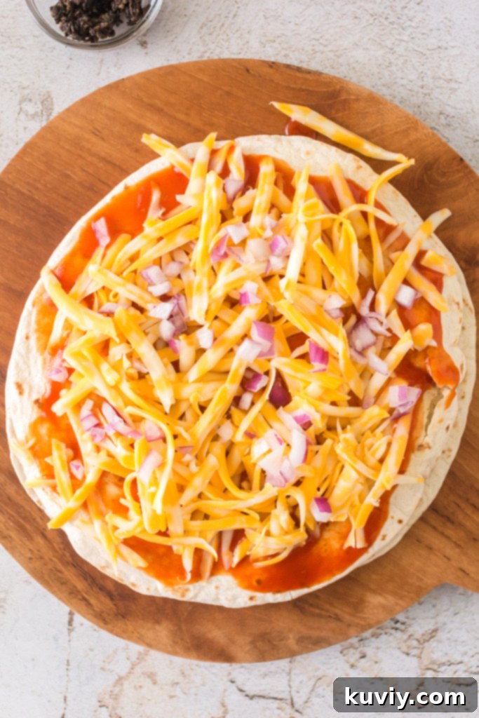 Crispy Air Fryer Mexican Pizza 3 Ingredients for Air Fryer Mexican Pizza, including enchilada sauce