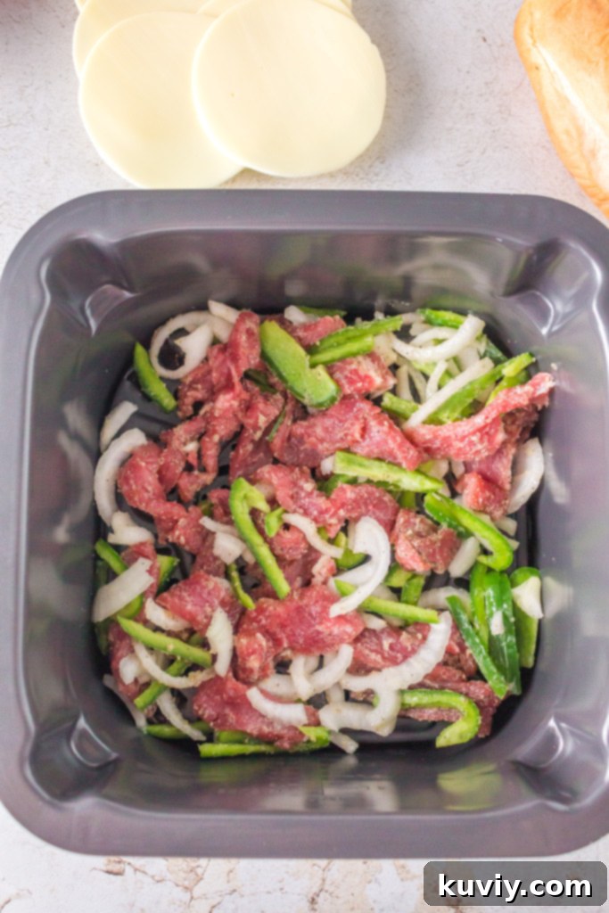 A close-up of thinly sliced Ribeye steak mixed with seasonings, ready for cooking.