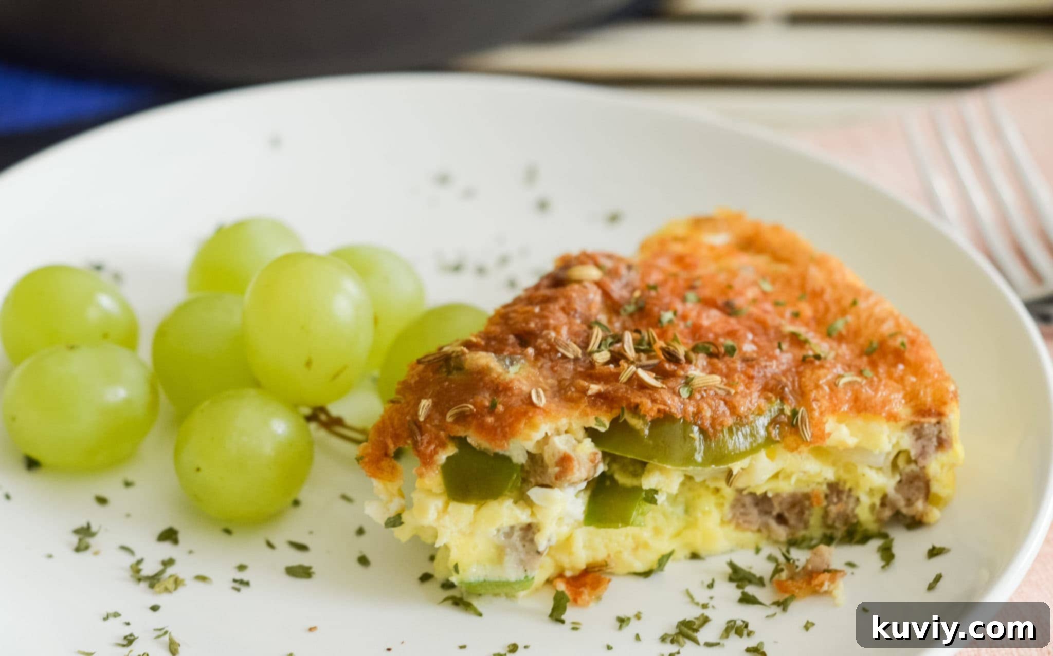Close-up of cooked Air Fryer Low-Carb Breakfast Casserole, showcasing the texture of the eggs and fillings