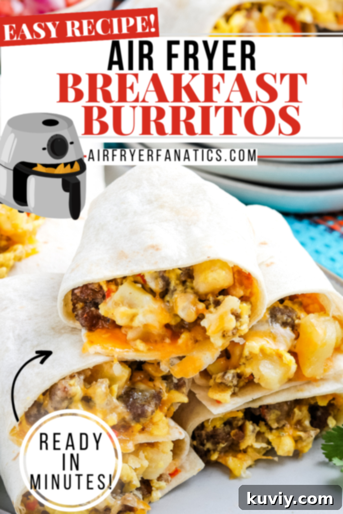 Two Air Fryer Breakfast Burritos, one cut in half to show filling