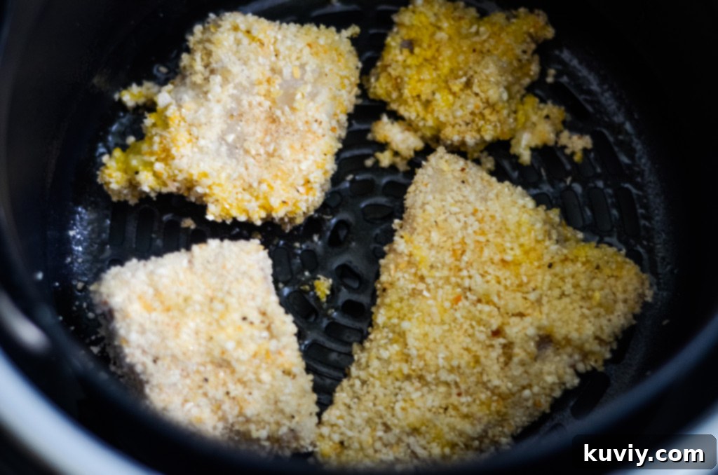 Air Fryer Fish Sandwiches being assembled