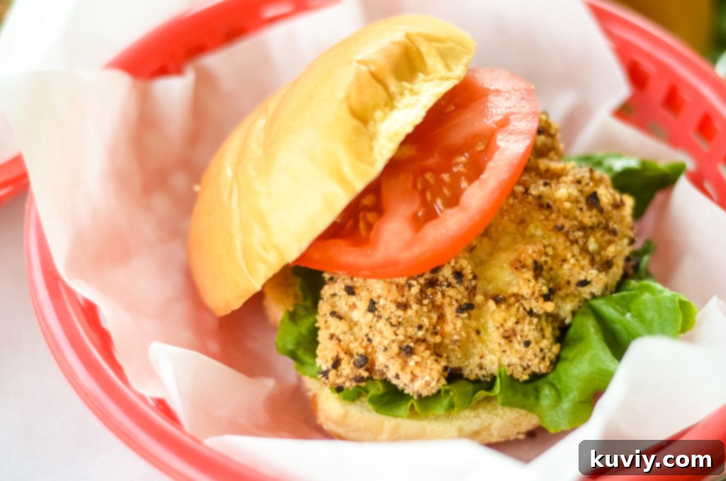 Assembled Air Fryer Fish Sandwich with side dish
