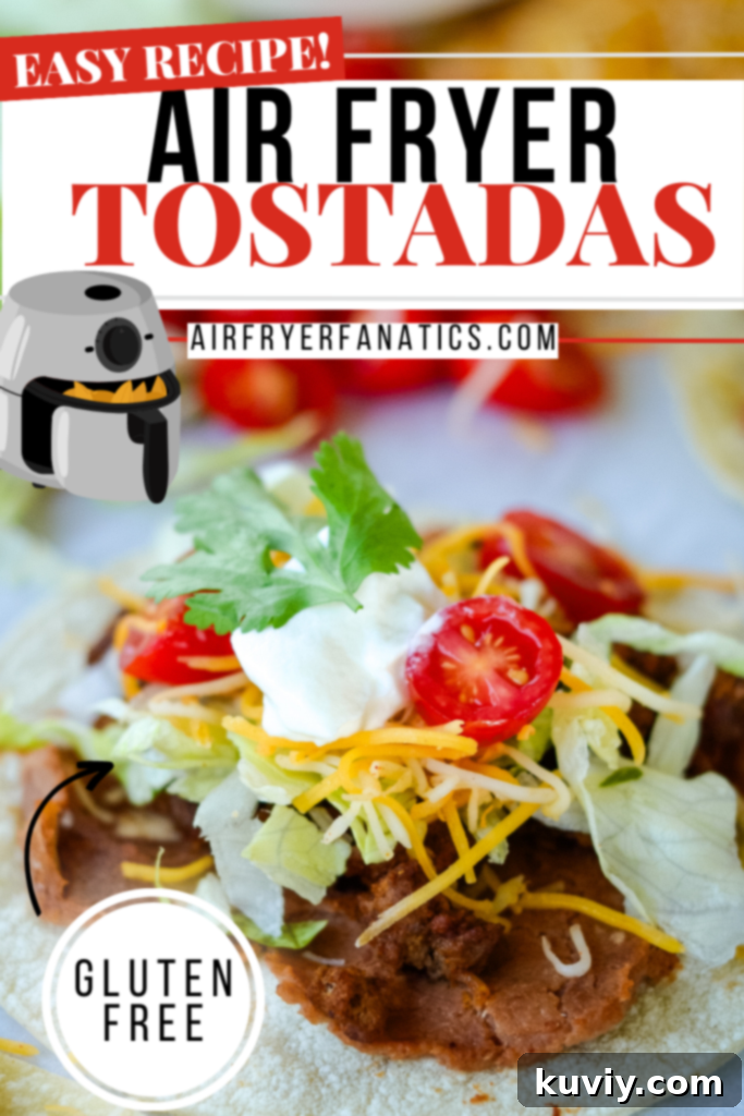 Finished air fryer tostadas with fresh toppings and a side of salsa