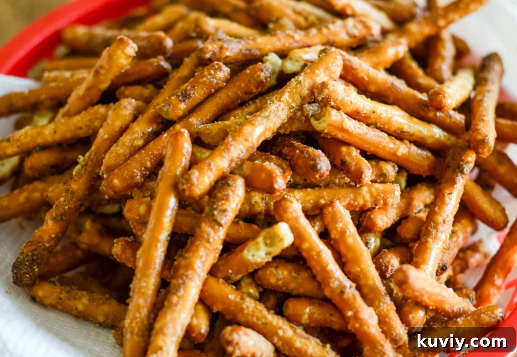 Close-up of seasoned pretzels in an air fryer basket