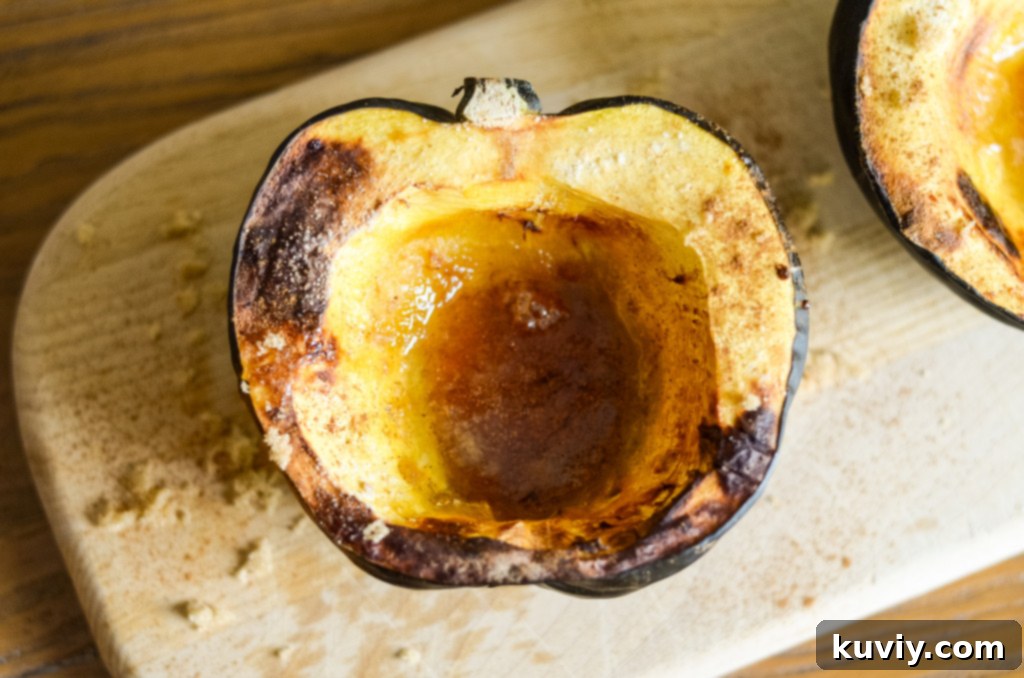 Close-up of butter, brown sugar, and maple syrup melting into acorn squash